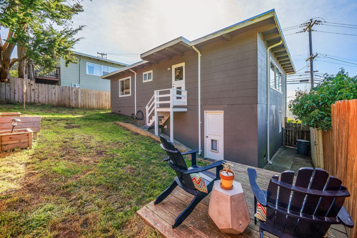 559 Manor Drive Pacifica, CA 94044 - Photo 36 of 38 a backyard of a house with seating space