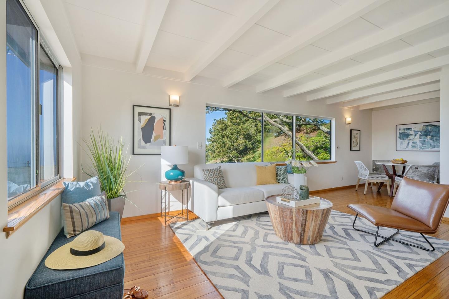 559 Manor Drive Pacifica, CA 94044 - Photo 7 of 38 a living room with furniture and a potted plant