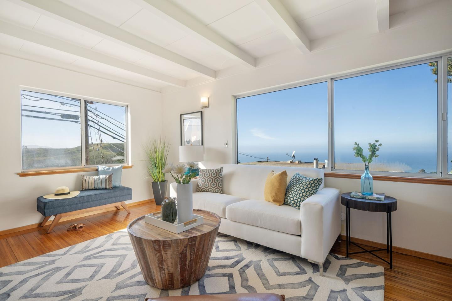 559 Manor Drive Pacifica, CA 94044 - Photo 8 of 38 a living room with furniture and a potted plant