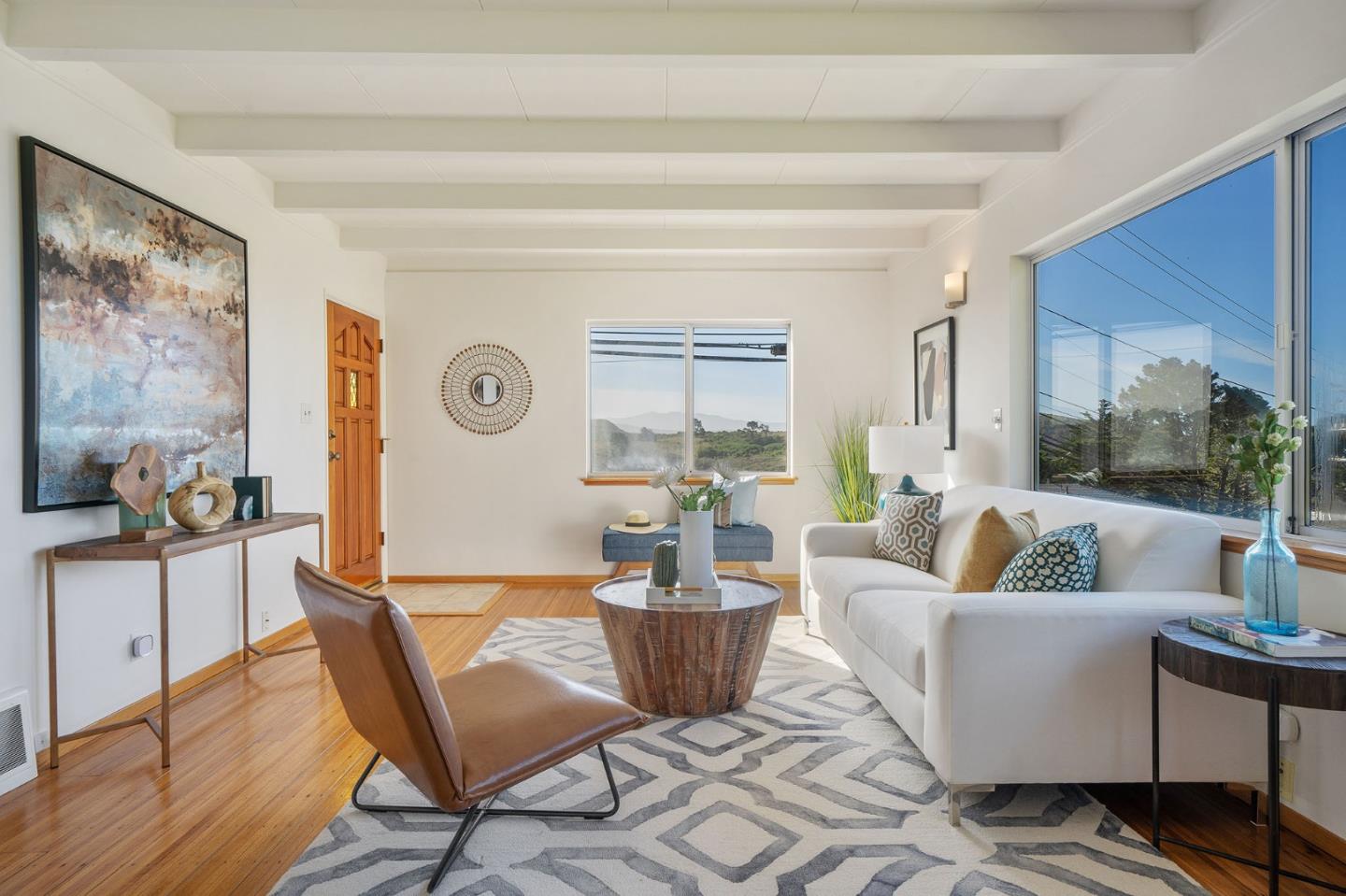 559 Manor Drive Pacifica, CA 94044 - Photo 9 of 38 a living room with furniture and a potted plant