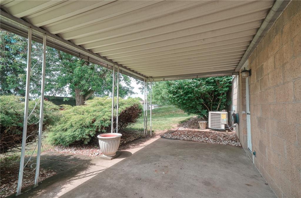 142 William Circle McKees Rocks, PA 15136 - Photo 15 of 23 a view of a patio with a table chairs and backyard