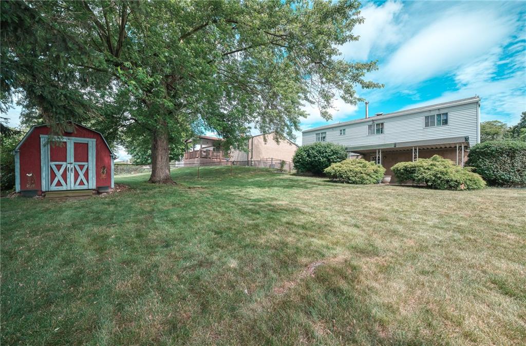 142 William Circle McKees Rocks, PA 15136 - Photo 17 of 23 a view of a house with a backyard