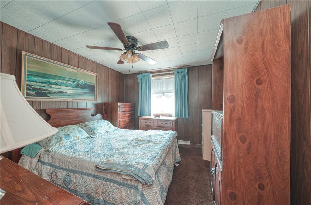 142 William Circle McKees Rocks, PA 15136 - Photo 7 of 23 a bedroom with a bed mirror and window