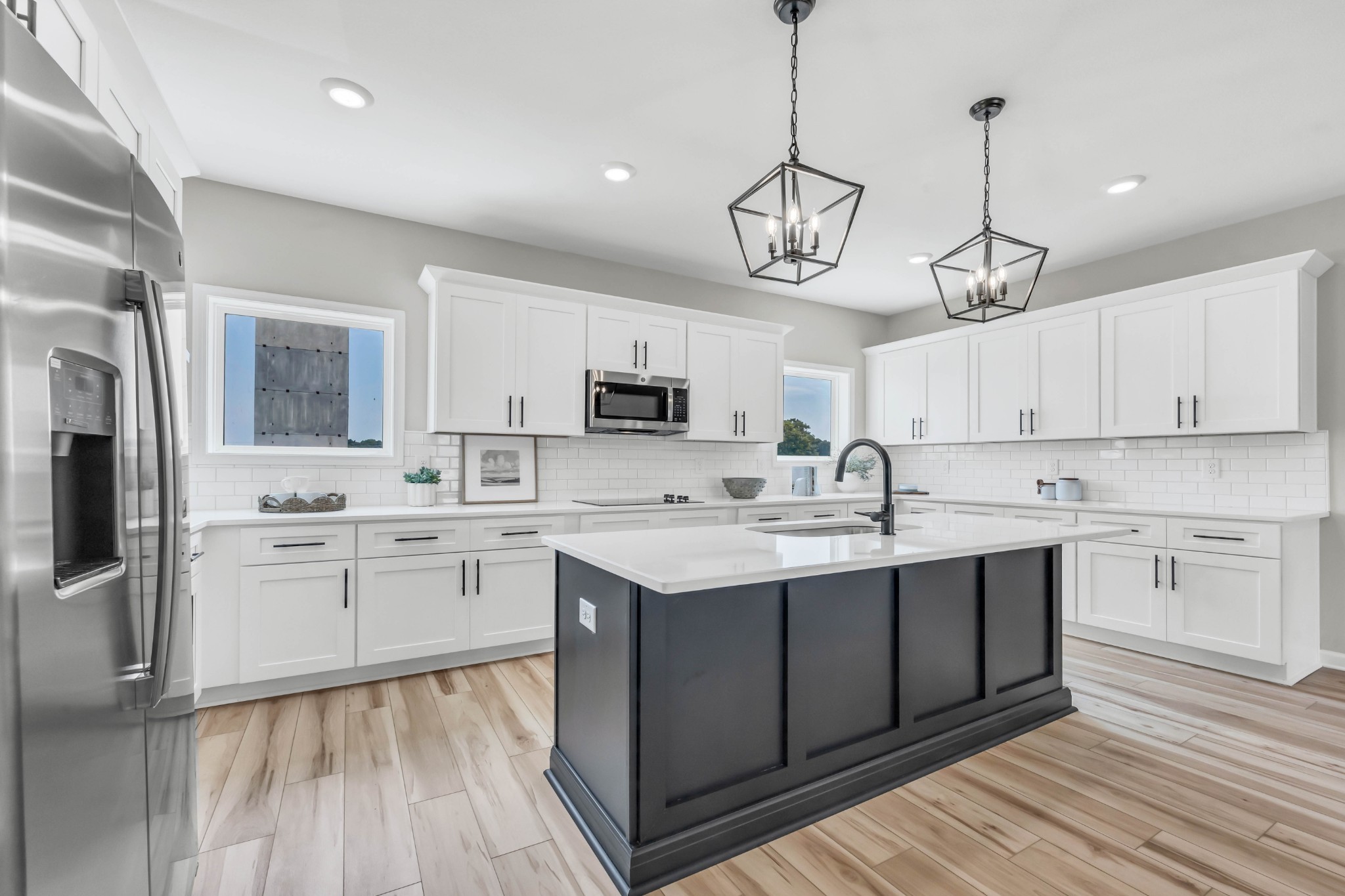 2365 Pea Ridge Road Clarksville, TN 37040 - Photo 19 of 28 a kitchen with a sink stainless steel appliances and cabinets