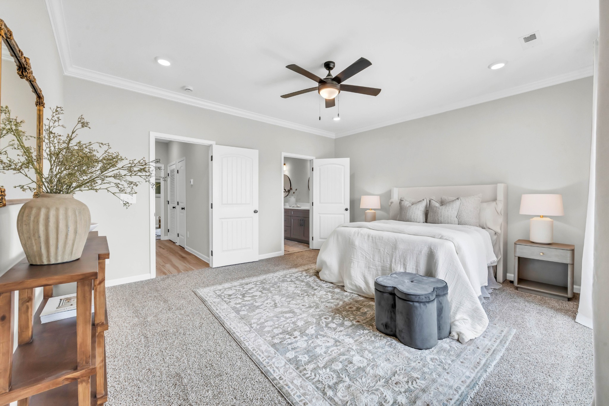 2365 Pea Ridge Road Clarksville, TN 37040 - Photo 24 of 28 a bedroom with a large bed and a chandelier