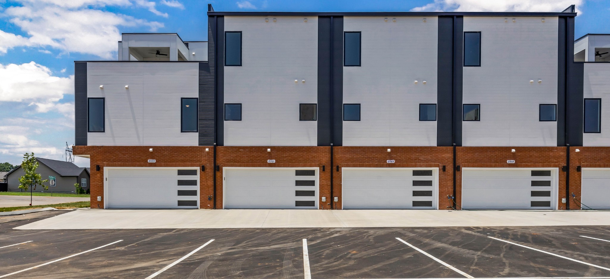 2365 Pea Ridge Road Clarksville, TN 37040 - Photo 27 of 28 a front view of a building with a glass door and a window