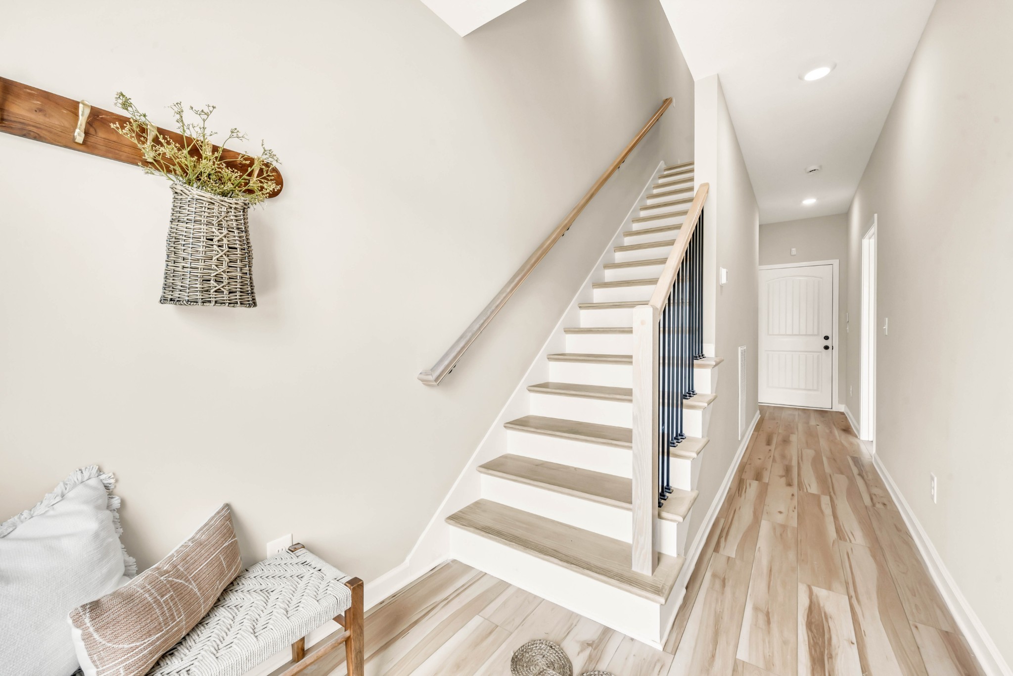 2365 Pea Ridge Road Clarksville, TN 37040 - Photo 9 of 28 a view of a bedroom with wooden floor and stairs