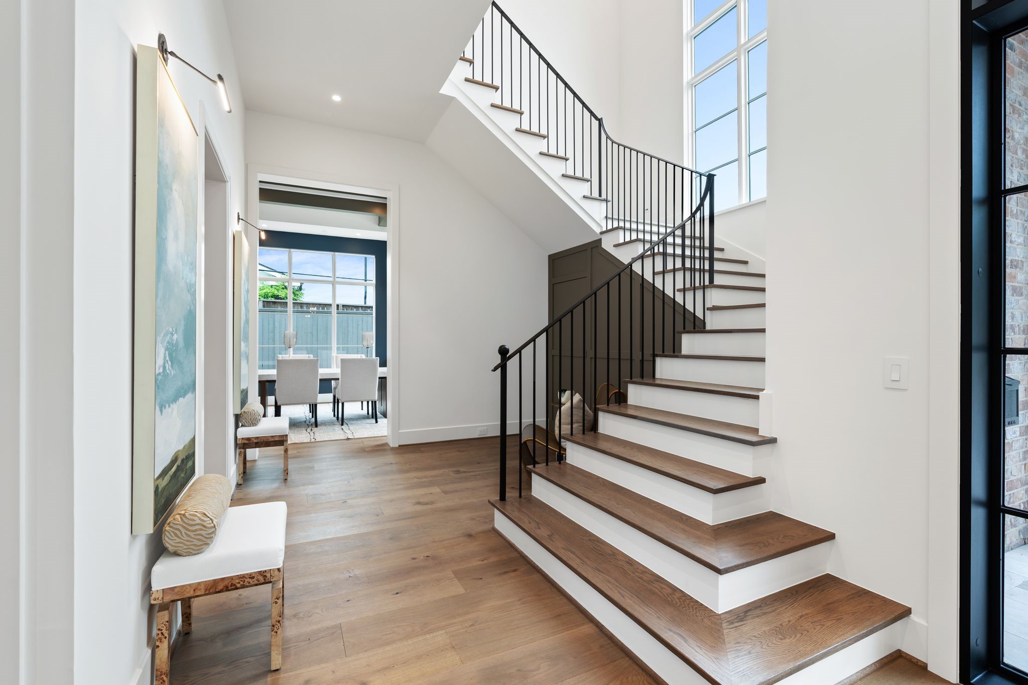 827 Rocky River Road Houston, TX 77056 - Photo 5 of 50 Right of the Entry Foyer is the main Staircase and elevator bay which flows into the formal dining room.