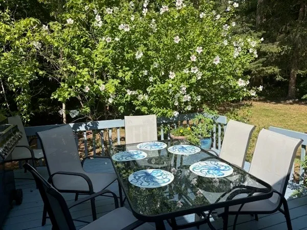 a view of sitting area in front of a house