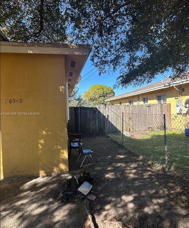 26540 Southwest 138th Avenue Homestead, FL 33032 - Photo 2 of 27 a view of a backyard