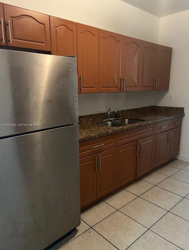 26540 Southwest 138th Avenue Homestead, FL 33032 - Photo 6 of 27 a kitchen with stainless steel appliances granite countertop a refrigerator and a cabinets