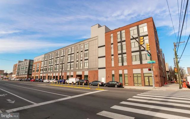 a view of a building with a street