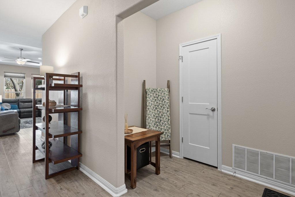 1720 Prather Street Taylor, TX 76574 - Photo 25 of 34 a view of room with furniture and wooden floor