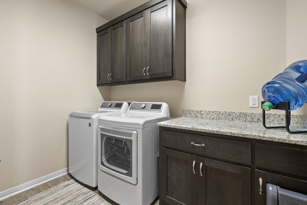 1720 Prather Street Taylor, TX 76574 - Photo 26 of 34 a utility room with dryer and washer