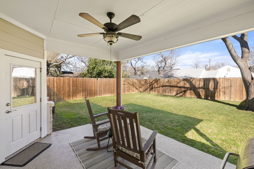 1720 Prather Street Taylor, TX 76574 - Photo 28 of 34 a view of a porch with furniture and a yard