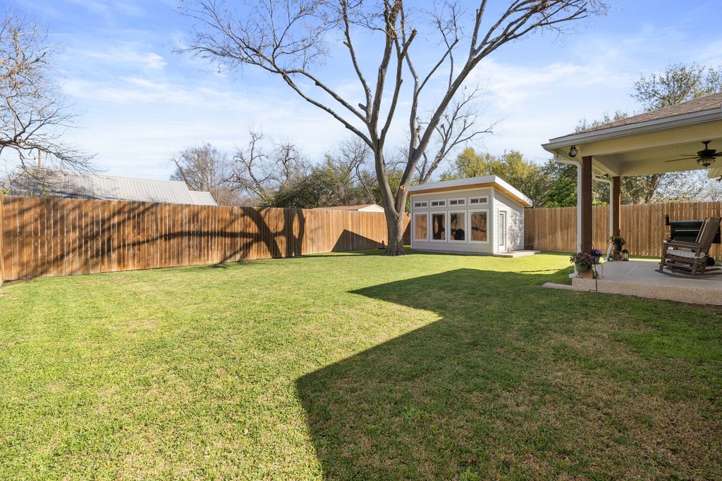 1720 Prather Street Taylor, TX 76574 - Photo 34 of 34 a view of a house with a yard
