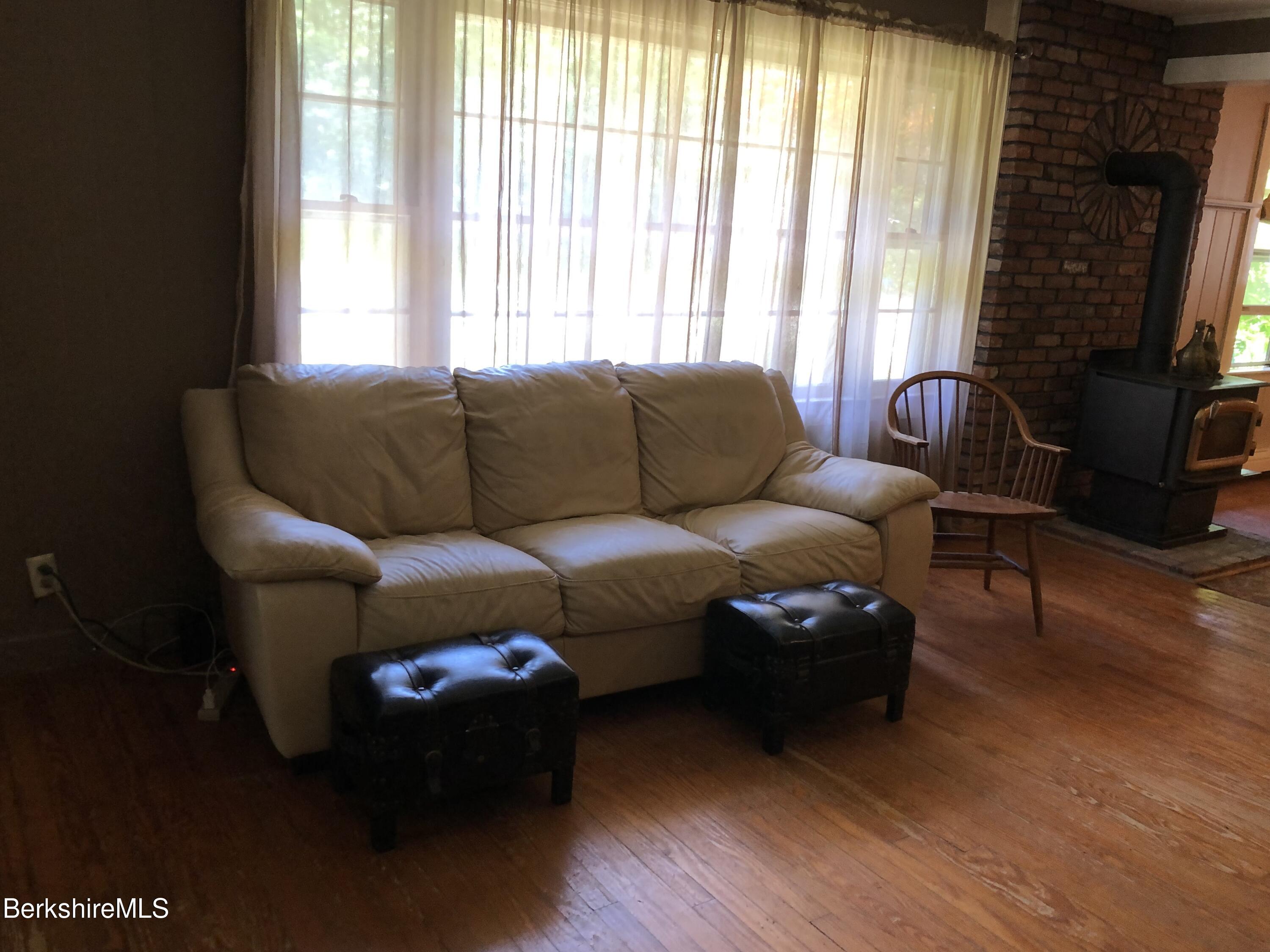 2959 Hancock Road Hancock, MA 01267 - Photo 23 of 55 a living room with furniture and a window