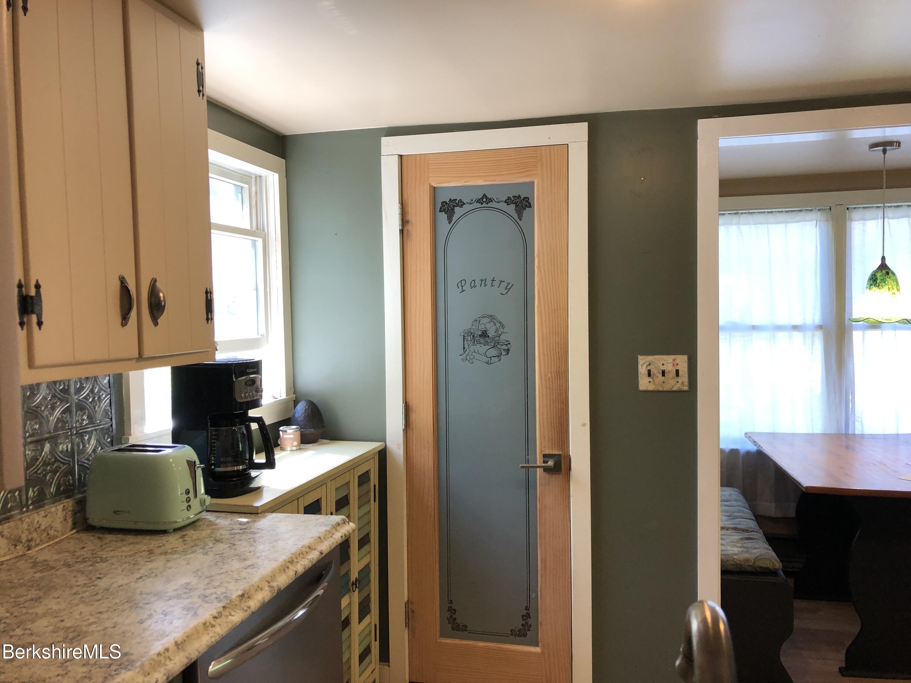 2959 Hancock Road Hancock, MA 01267 - Photo 6 of 55 a kitchen with granite countertop a sink and a refrigerator