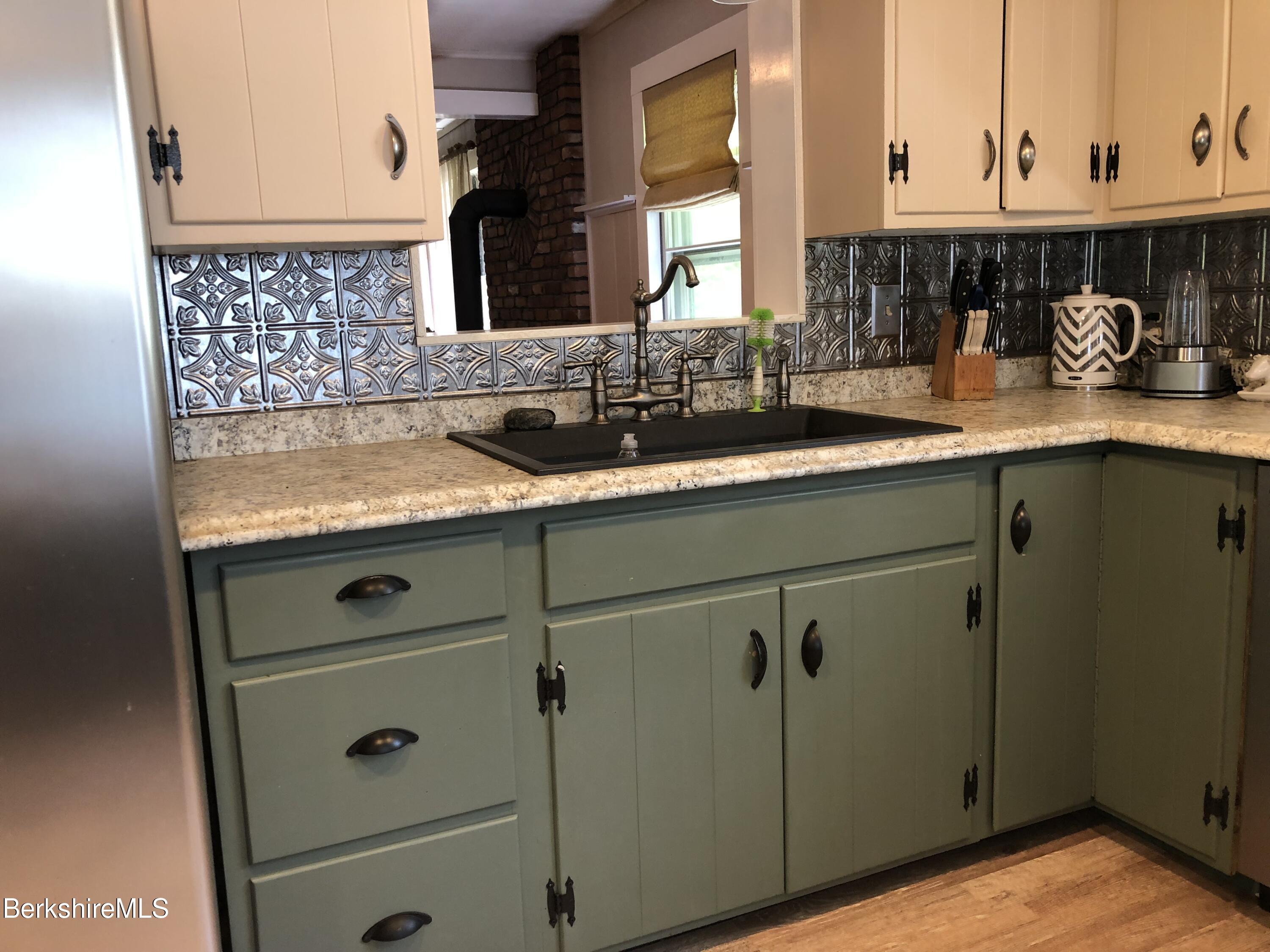 2959 Hancock Road Hancock, MA 01267 - Photo 10 of 55 a kitchen with a sink and cabinets