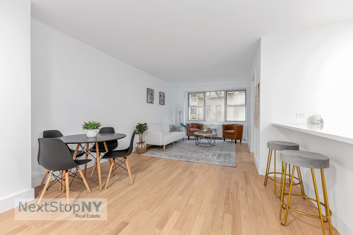 363 East 76th Street, Unit 2L Manhattan, NY 10021 - Photo 4 of 10 a view of a dining room with furniture