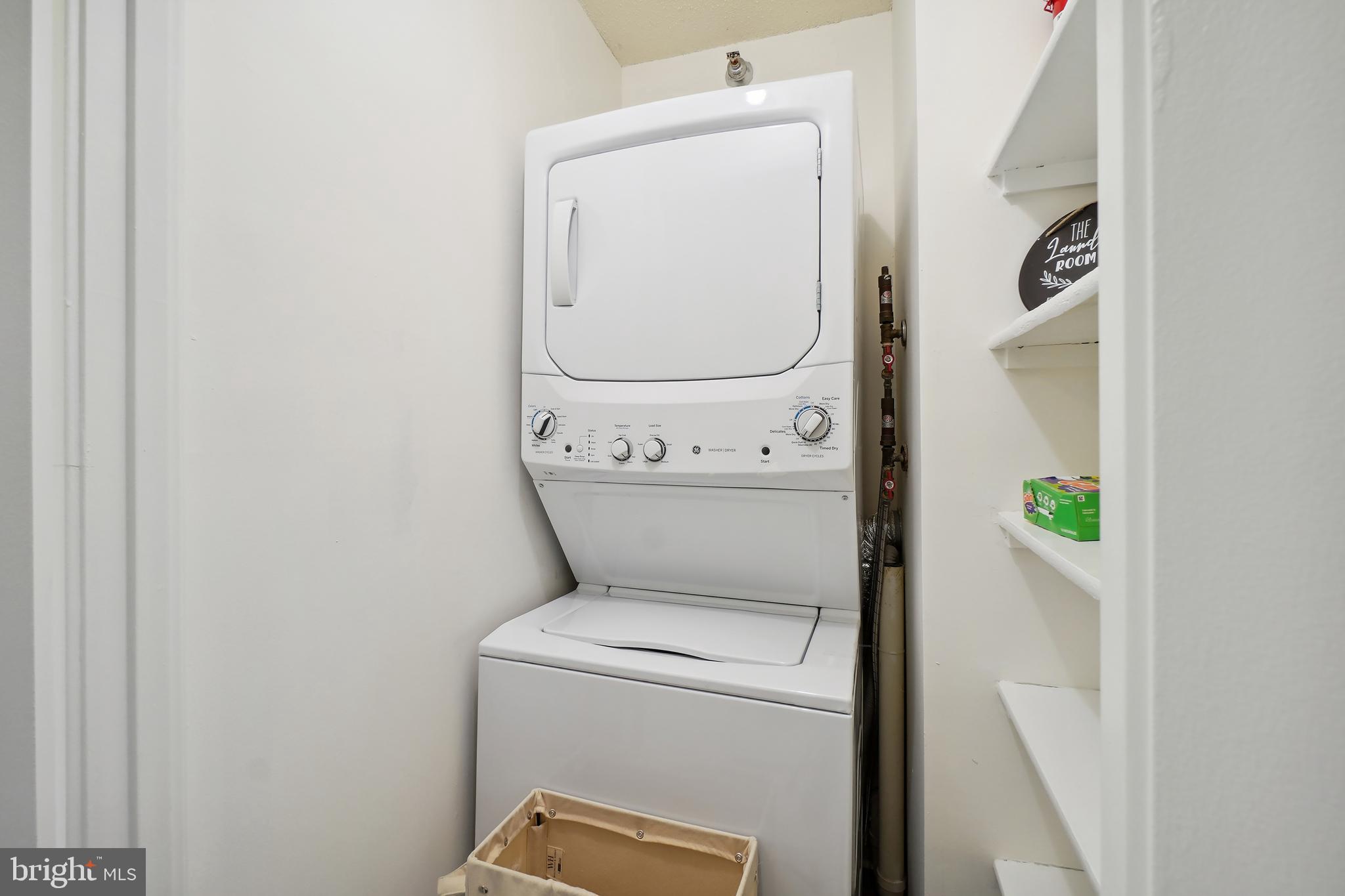 15100 Interlachen Drive, Unit 4517 Silver Spring, MD 20906 - Photo 18 of 42 a utility room with dryer and washer
