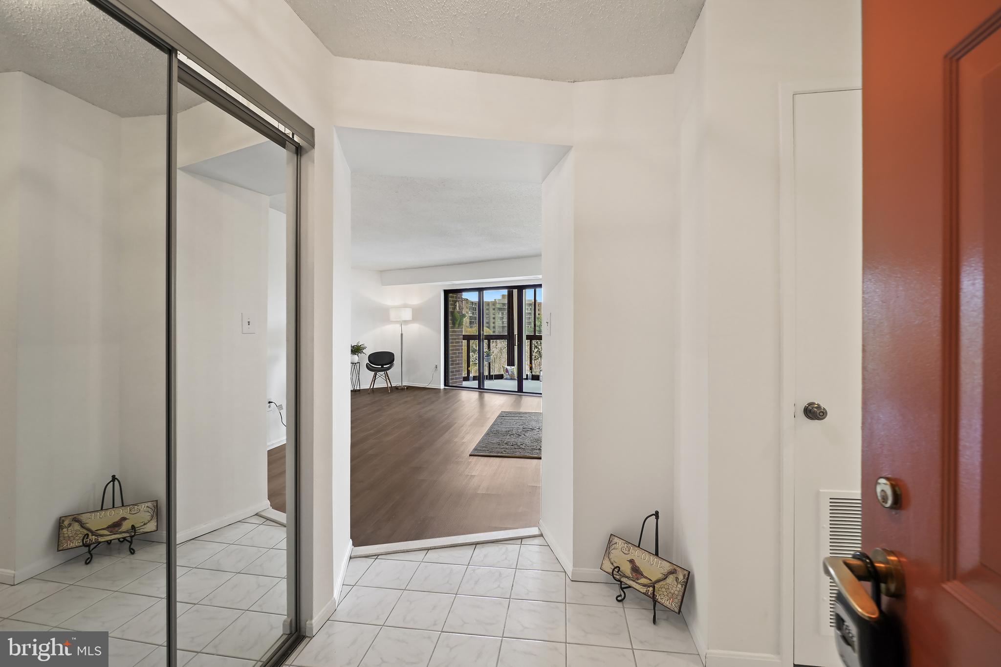 15100 Interlachen Drive, Unit 4517 Silver Spring, MD 20906 - Photo 3 of 42 a view of a hallway