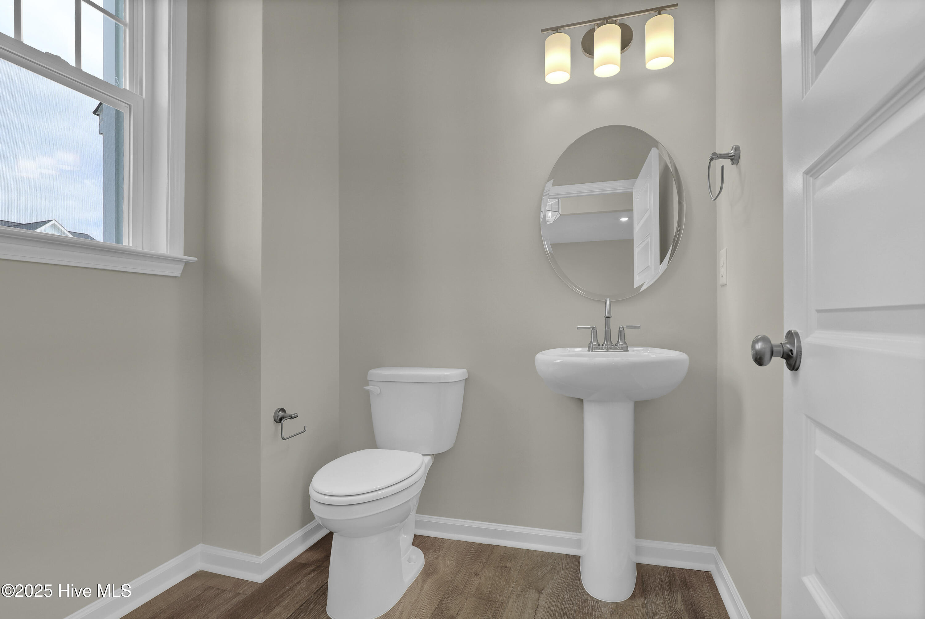 230 Planters Walk Hampstead, NC 28443 - Photo 7 of 39 Powder Bathroom