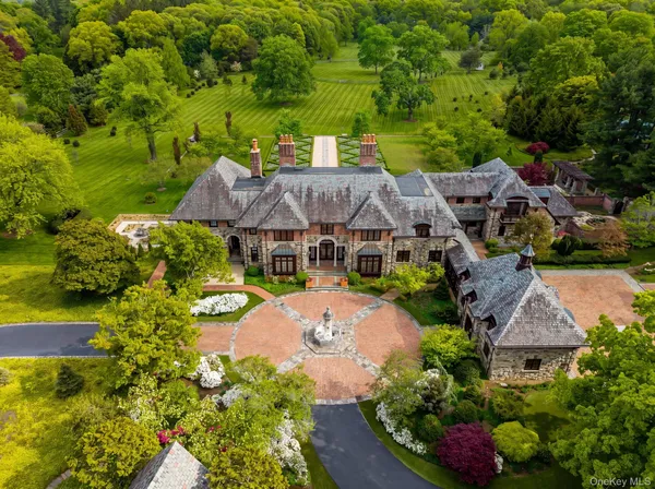 an aerial view of a house with a garden