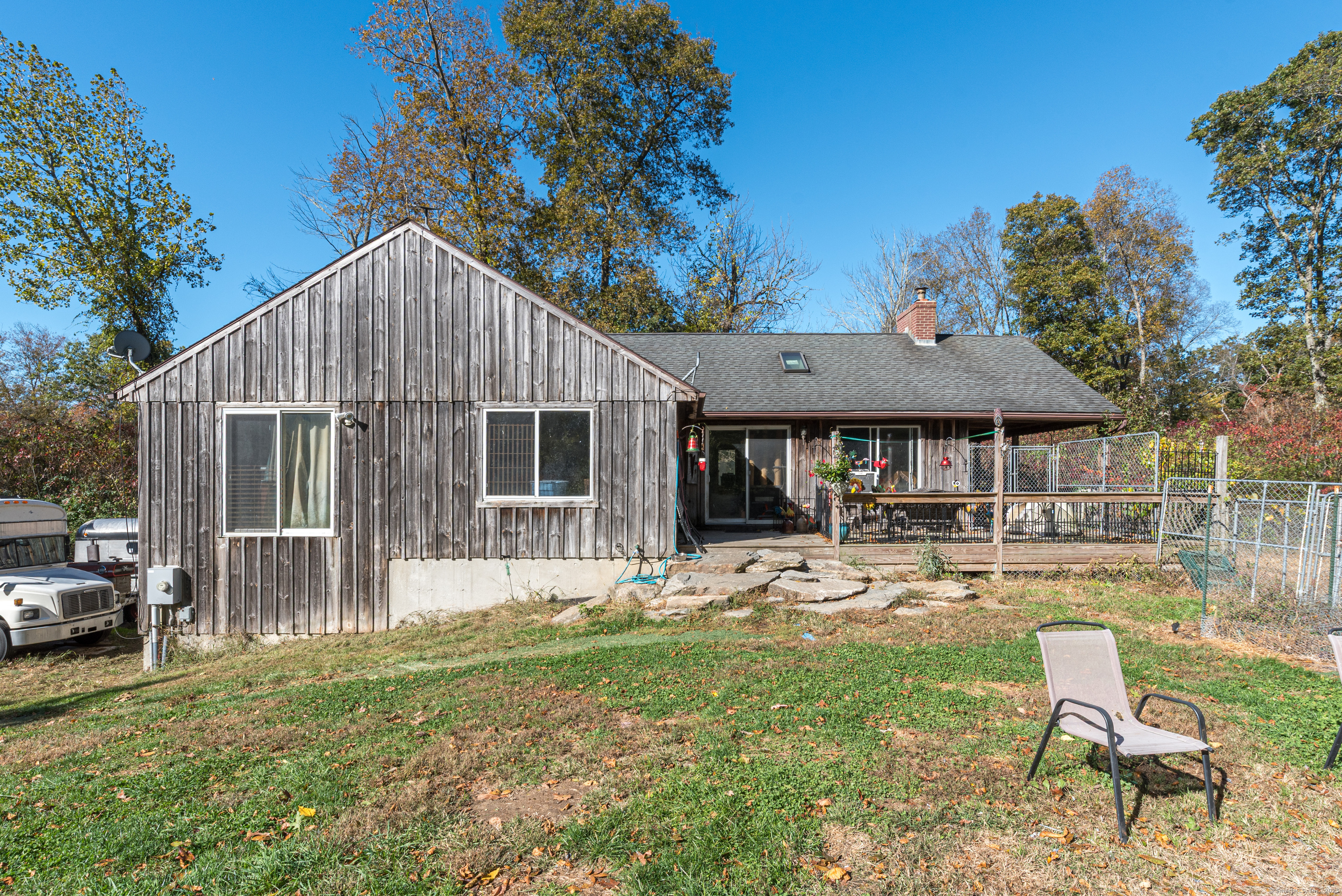 Undisclosed Address Windham, CT 06256 - Photo 1 of 39 a house with garden in front of it