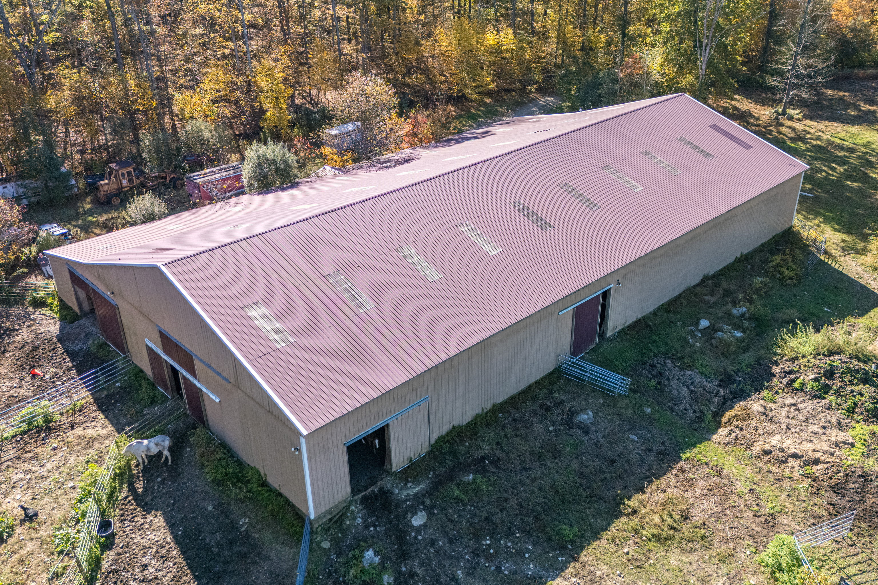 Undisclosed Address Windham, CT 06256 - Photo 12 of 39 a backyard of a house with lots of green space