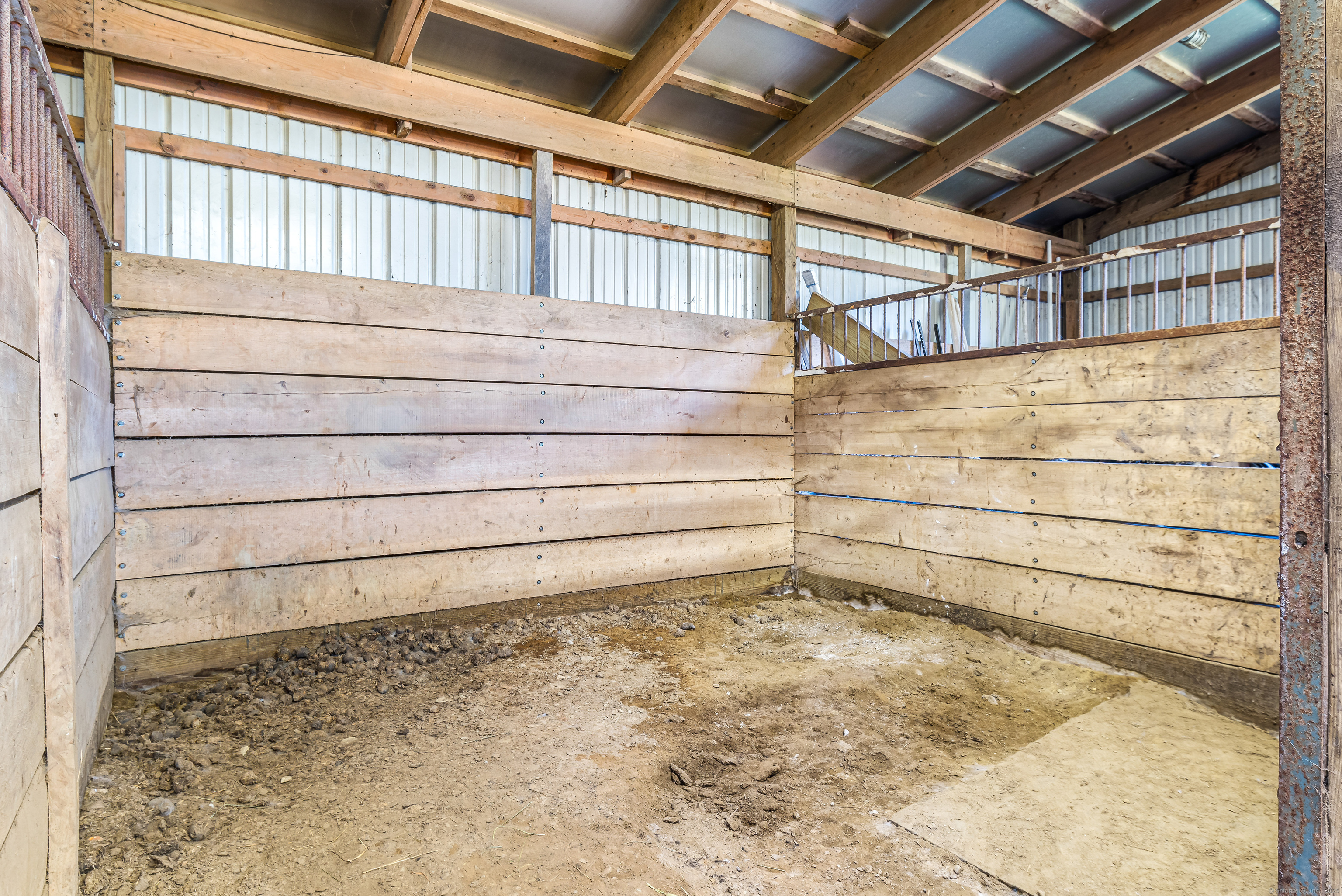Undisclosed Address Windham, CT 06256 - Photo 21 of 39 a view of a room with racks on the wall