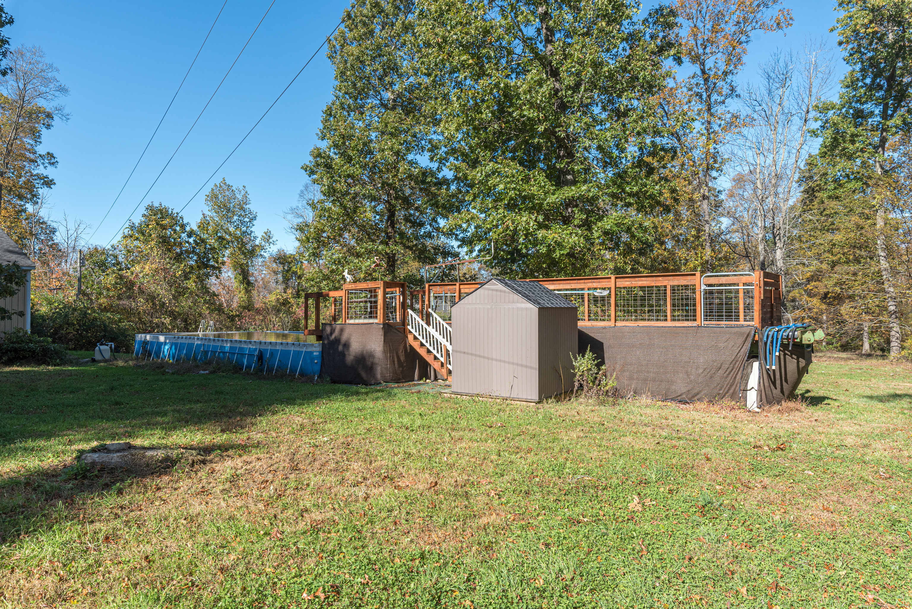 Undisclosed Address Windham, CT 06256 - Photo 3 of 39 a view of a house with a yard