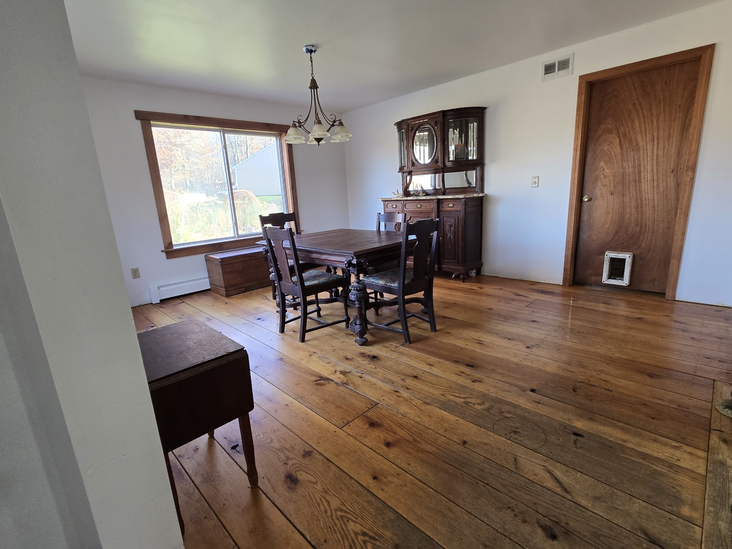 Undisclosed Address Windham, CT 06256 - Photo 34 of 39 a view of a dining room with furniture and window