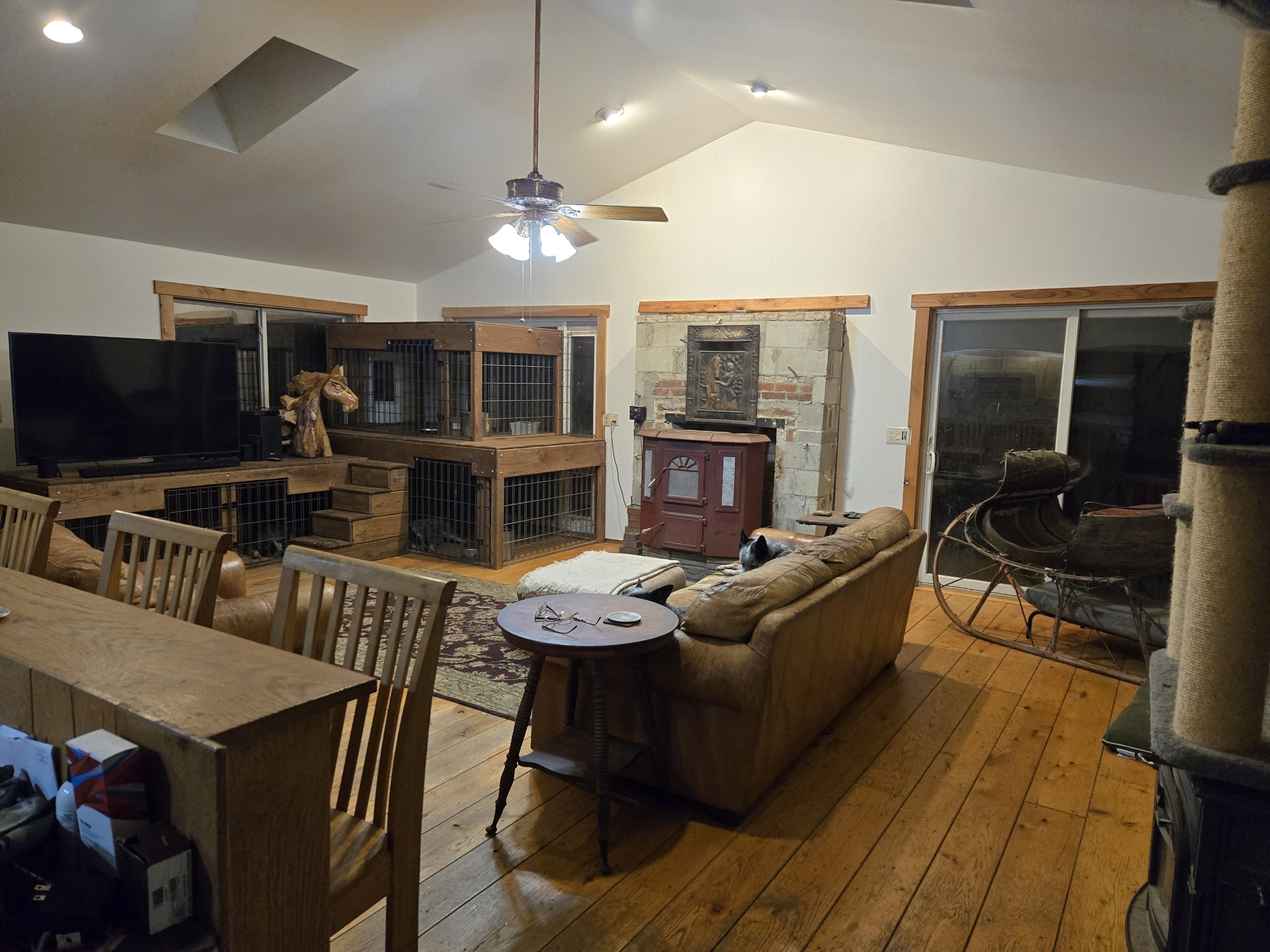 Undisclosed Address Windham, CT 06256 - Photo 35 of 39 a living room with furniture a flat screen tv and kitchen view