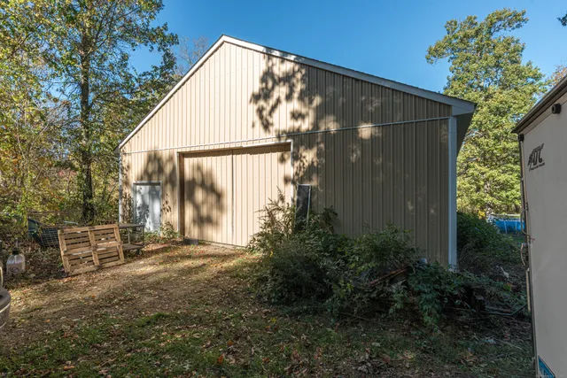 a backyard of a house with lots of green space