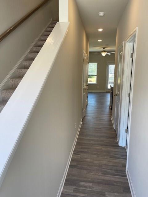 585 McWilliams Road Southeast, Unit 707 Atlanta, GA 30315 - Photo 5 of 10 a view of a hallway with wooden floor and staircase