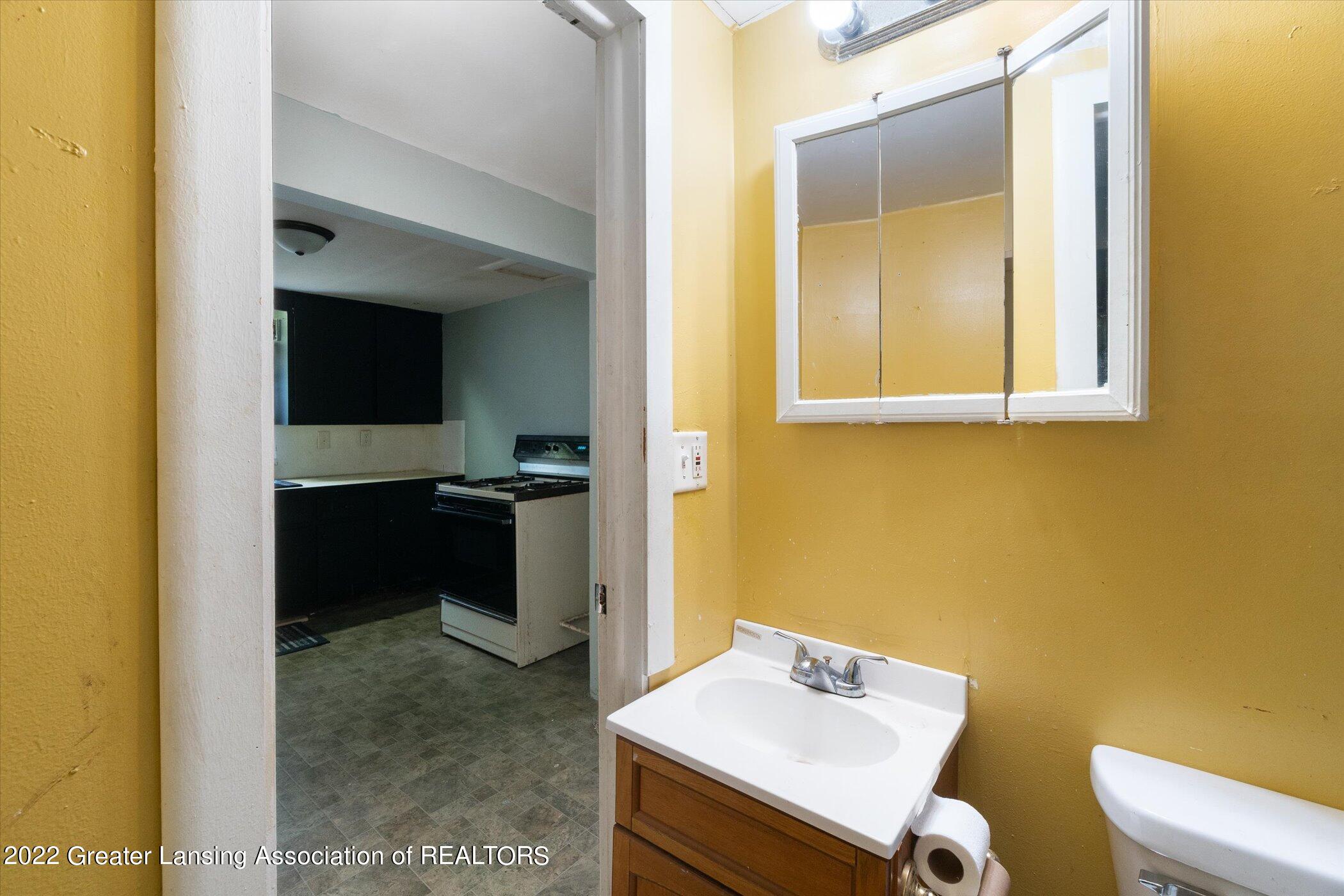 5439 Hughes Road Lansing, MI 48911 - Photo 7 of 10 09-5439-Hughes-Rd-WindowStill-Real-Estat