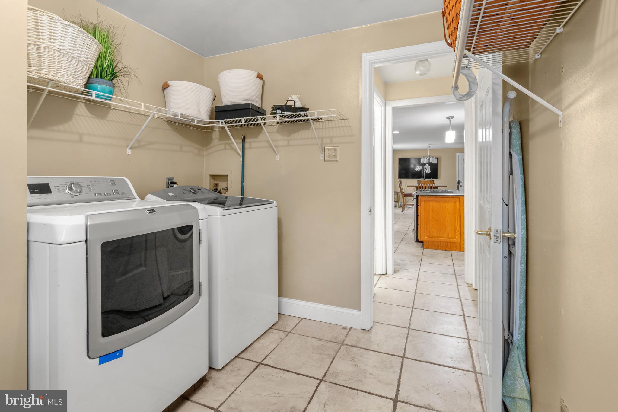 8489 Roberts Road Ellicott City, MD 21043 - Photo 19 of 42 Full Laundry/Mud Room with Walkout to Side Yard
