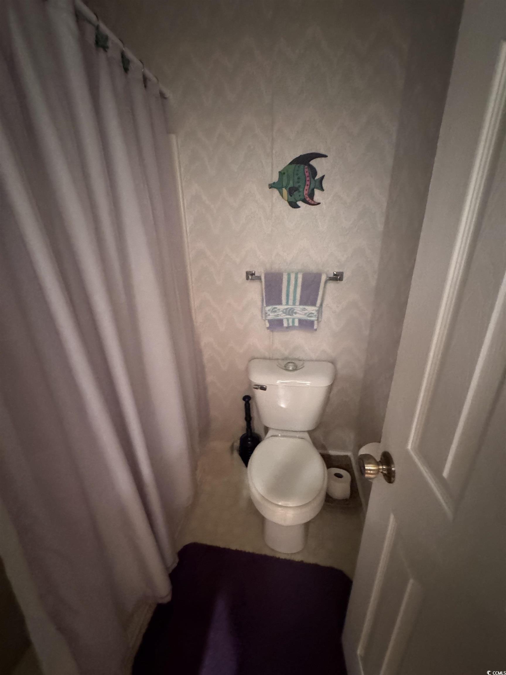 1900 Duffy Street, Unit J4 North Myrtle Beach, SC 29582 - Photo 14 of 22 Full bath with toilet and a shower with curtain