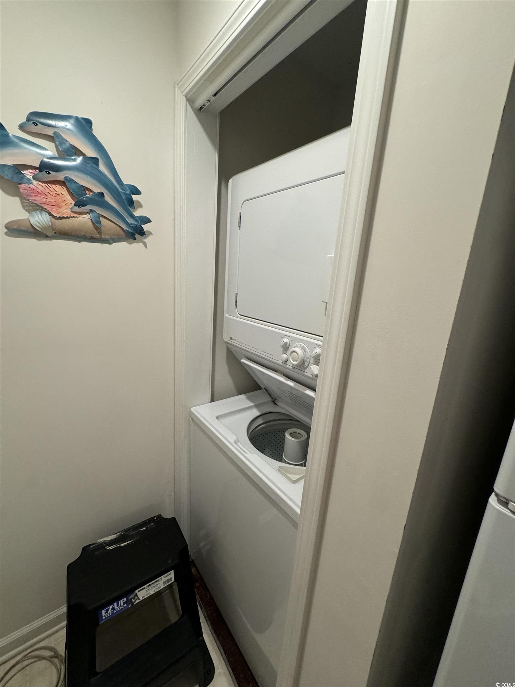 1900 Duffy Street, Unit J4 North Myrtle Beach, SC 29582 - Photo 10 of 22 Laundry area with estacked washer and dryer