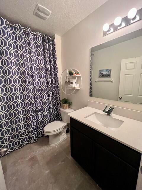 1117 Southwest Goodman Avenue Port St. Lucie, FL 34953 - Photo 11 of 18 a bathroom with a sink vanity mirror and toilet