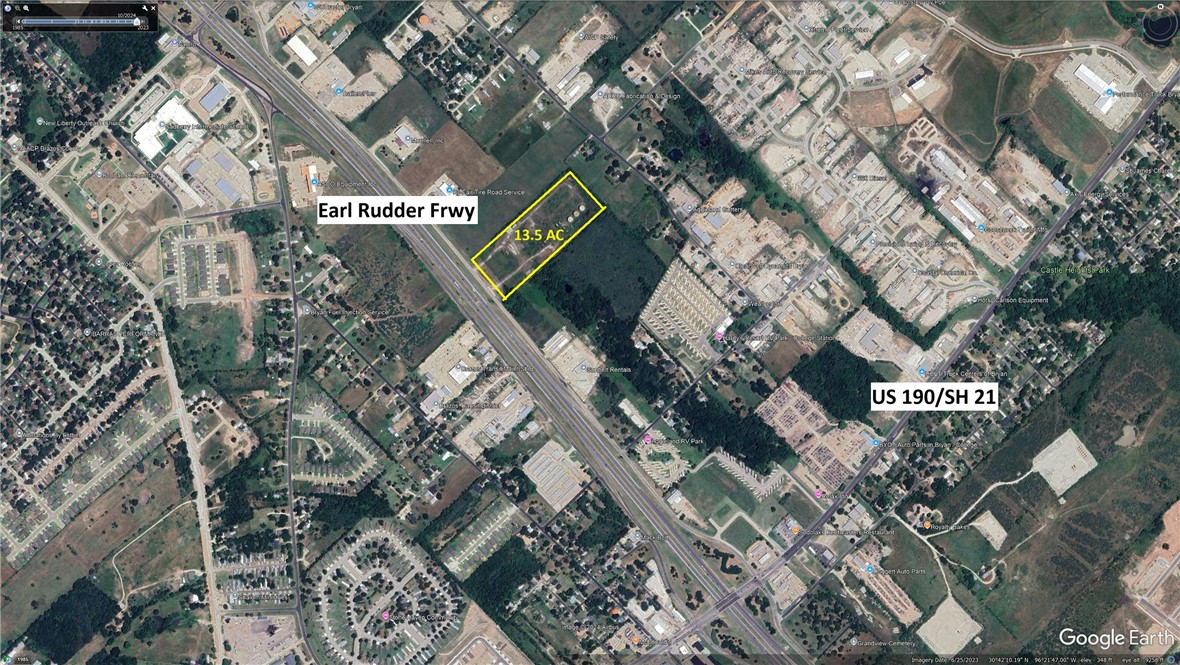 1794 North Earl Rudder Freeway Bryan, TX 77808 - Photo 3 of 7 a street view with tall buildings