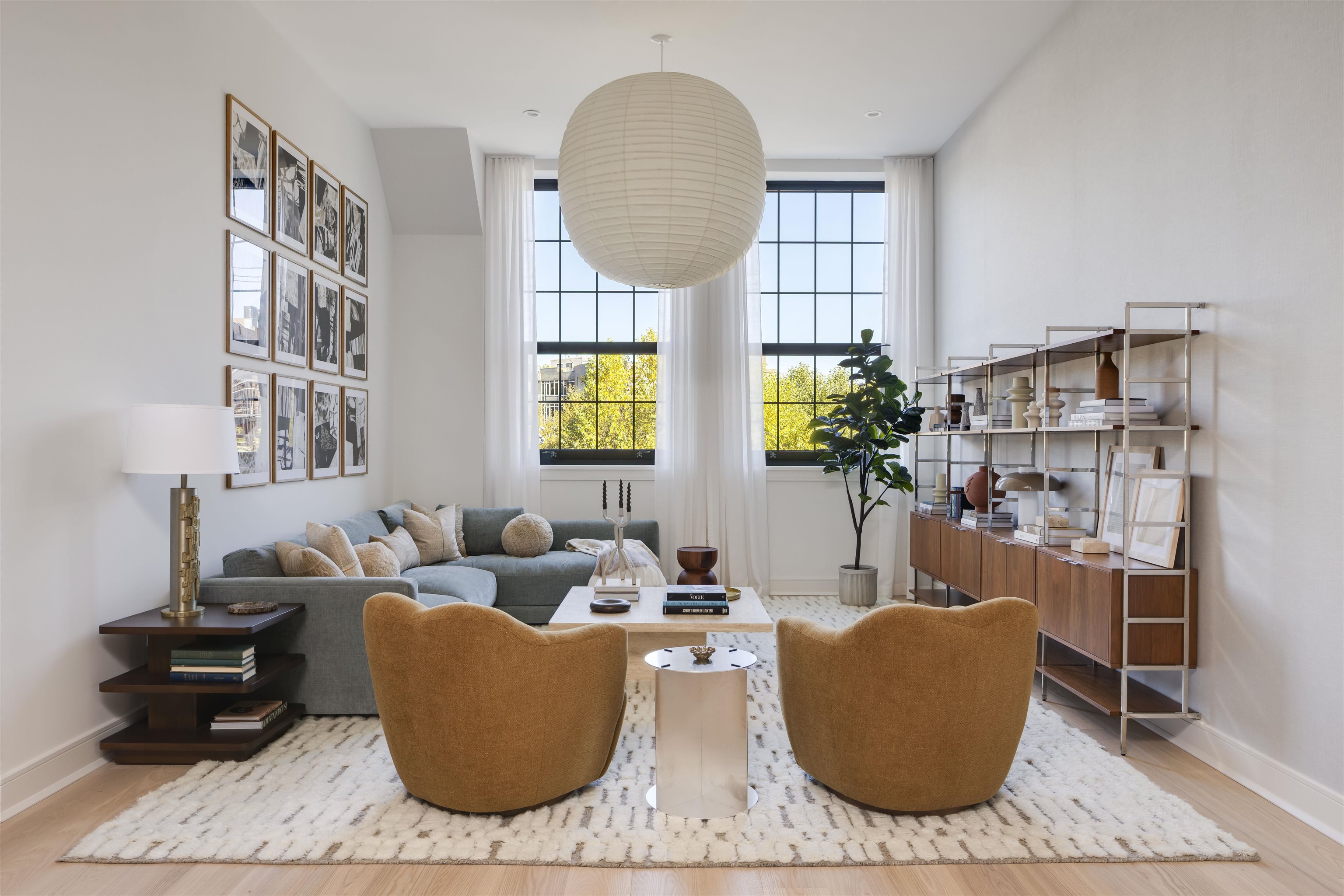 38 Jackson Street, Unit 313 Hoboken, NJ 07030 - Photo 1 of 20 a living room with furniture and a window