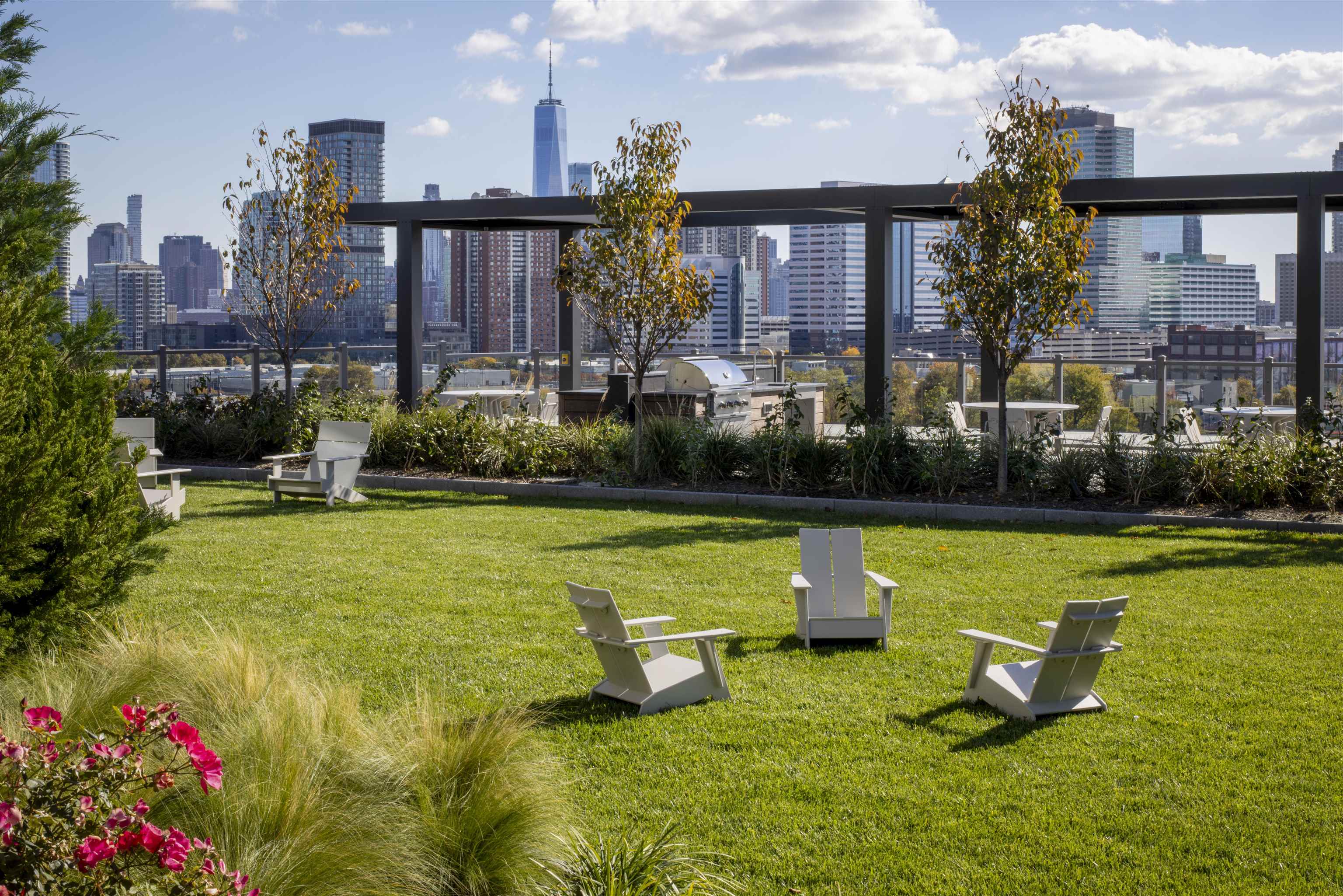 38 Jackson Street, Unit 313 Hoboken, NJ 07030 - Photo 11 of 20 a swimming pool with outdoor seating and yard