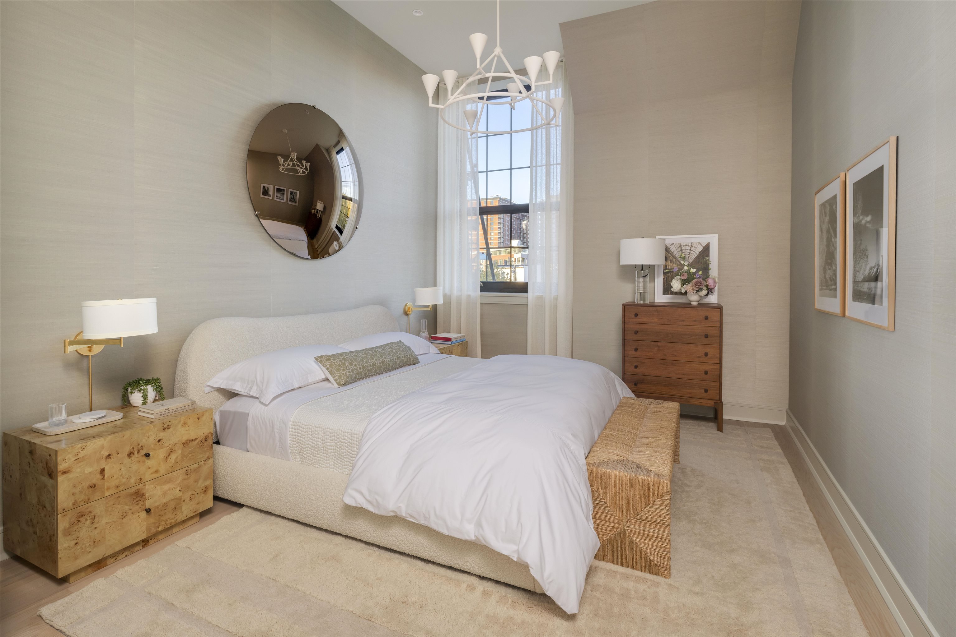 38 Jackson Street, Unit 313 Hoboken, NJ 07030 - Photo 4 of 20 a bedroom with a bed and a chandelier