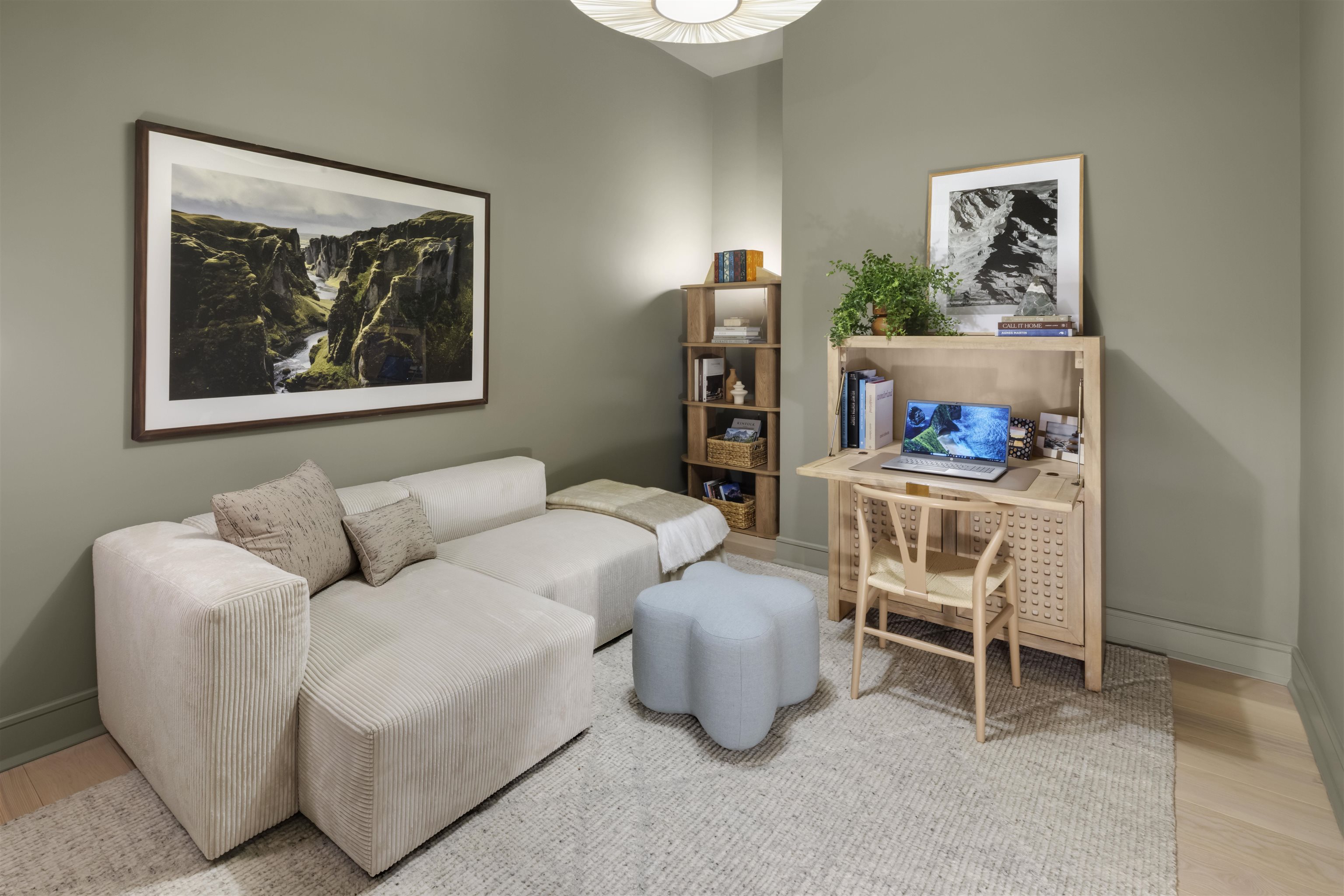 38 Jackson Street, Unit 313 Hoboken, NJ 07030 - Photo 9 of 20 a living room with furniture and a painting on the wall