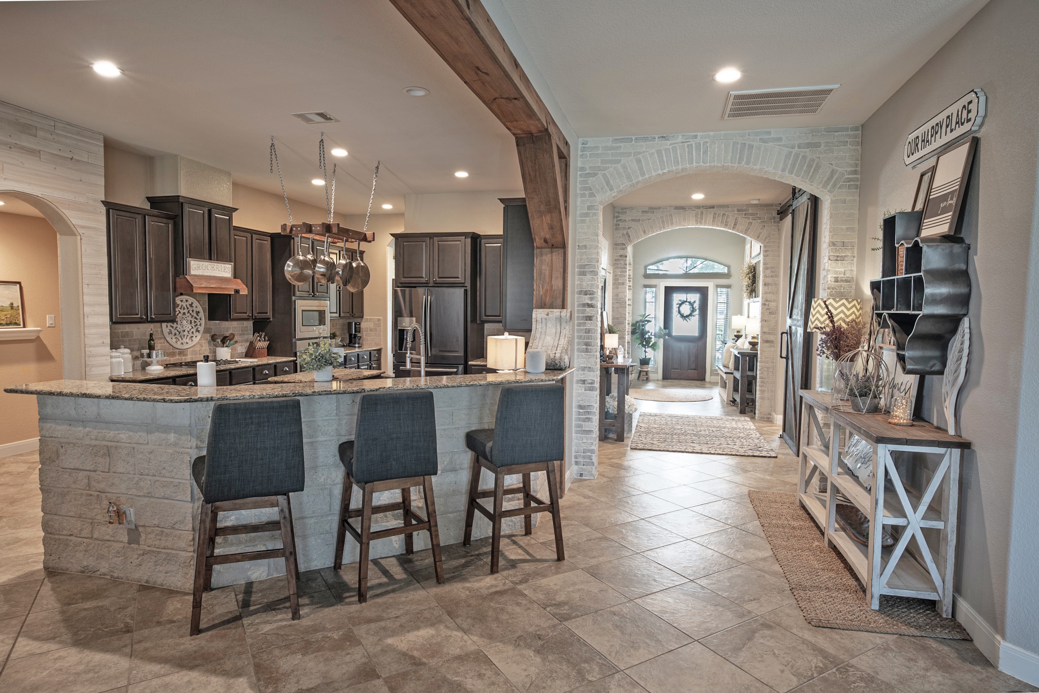 1283 Laurel Lane Angleton, TX 77515 - Photo 9 of 40 Wooden Accent Beam Along the Hall Ceiling to the Kitchen