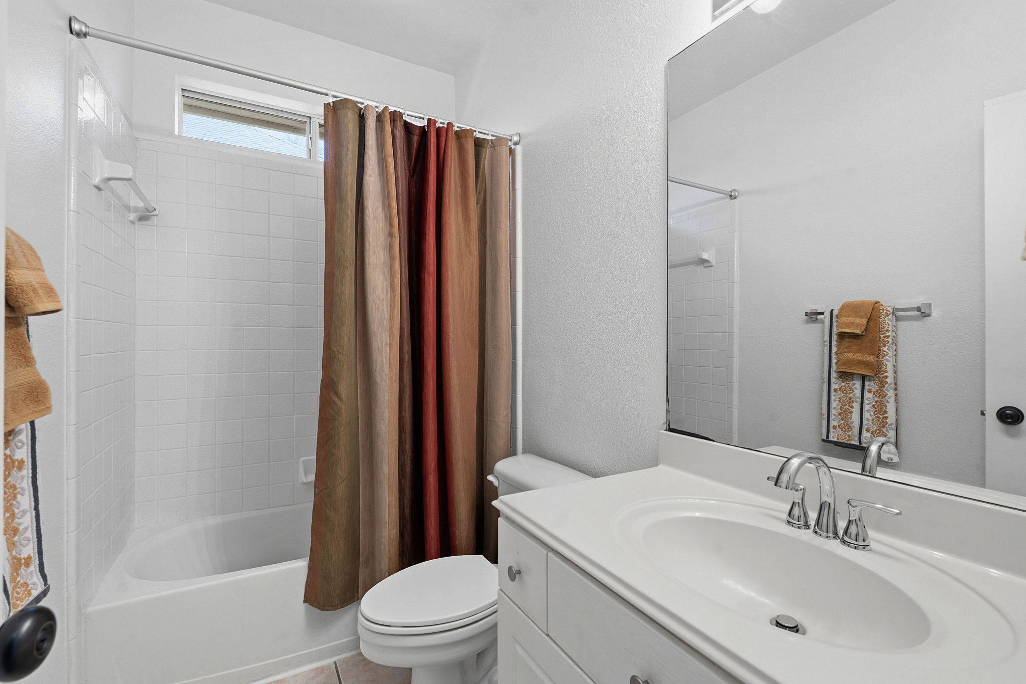 12716 Withers Way Austin, TX 78727 - Photo 20 of 29 a bathroom with a sink toilet and shower