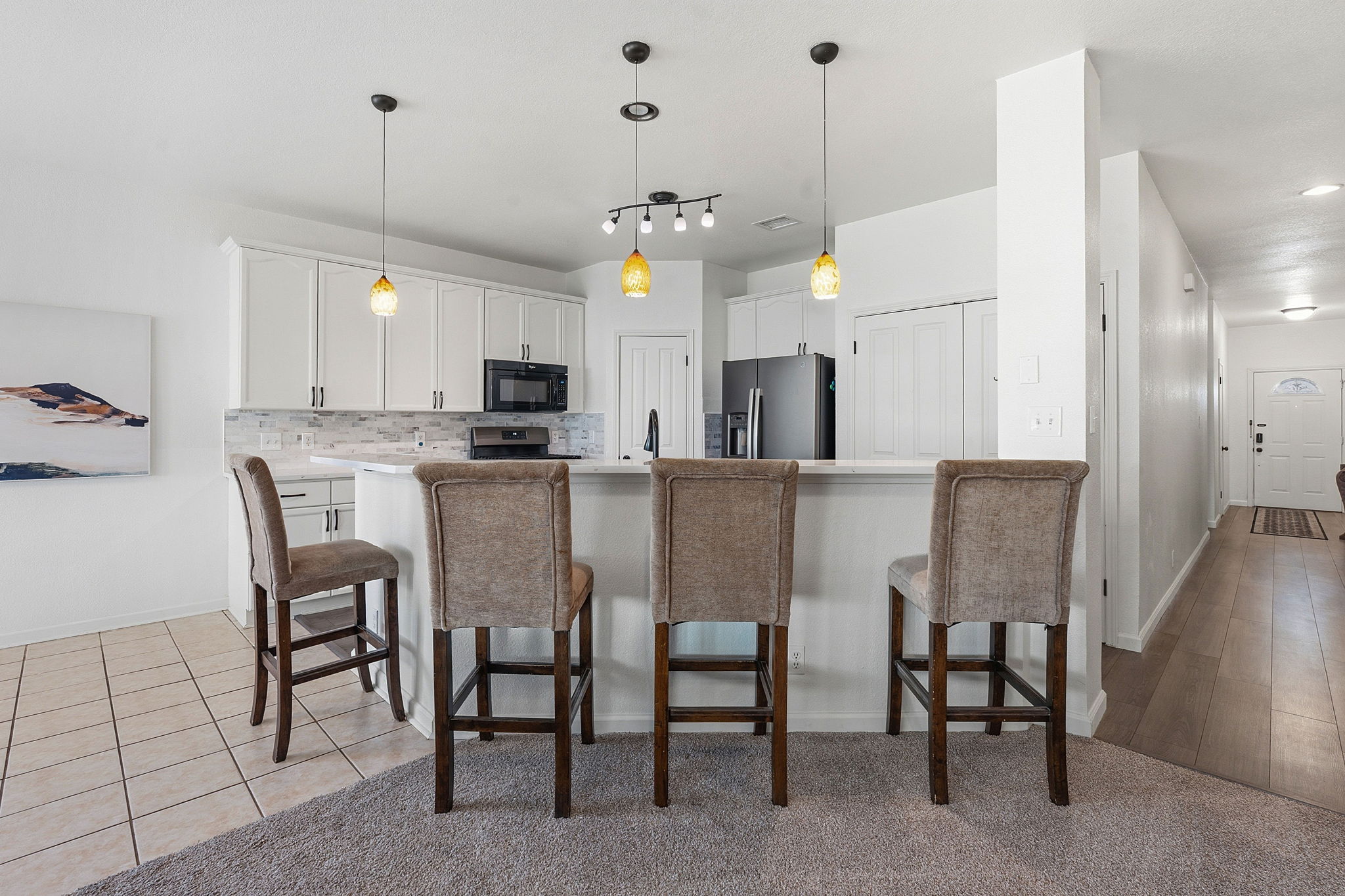 12716 Withers Way Austin, TX 78727 - Photo 6 of 29 a view of a dining room with furniture and wooden floor