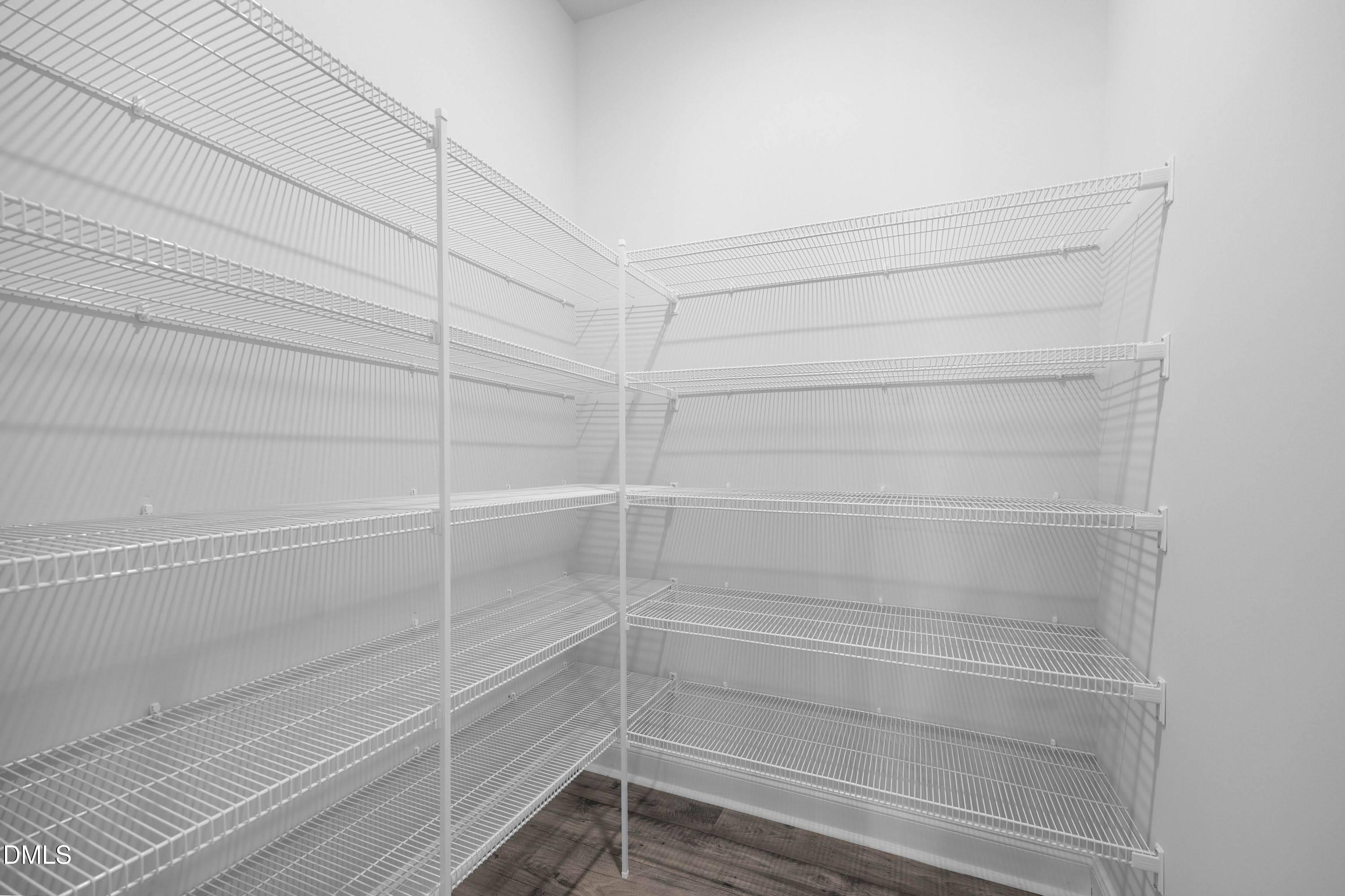 227 Galway Road Lillington, NC 27546 - Photo 16 of 36 a view of a room with empty racks